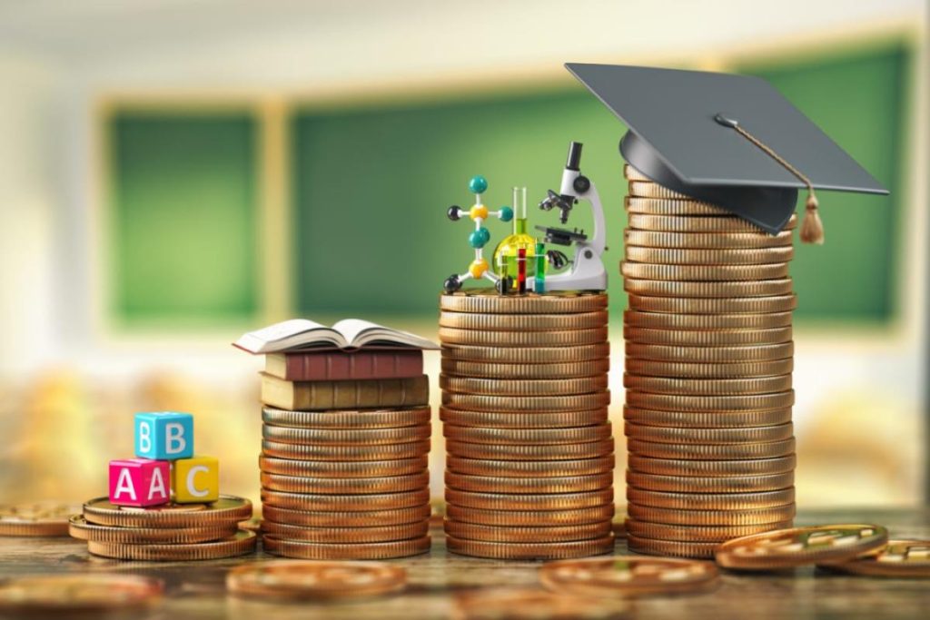 Stacks of coins with models on top